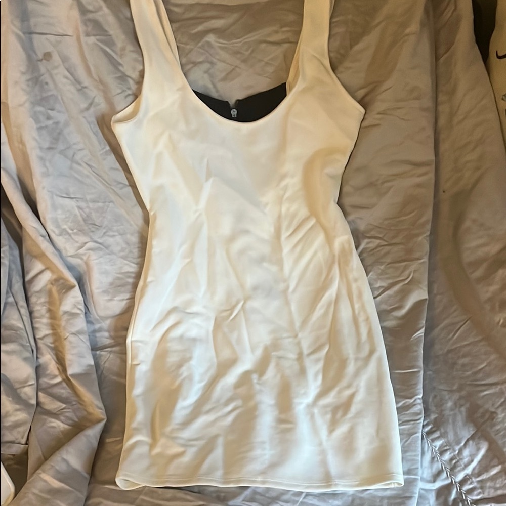 Chic White Dress with Black Cutout